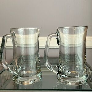 Two thick heavyweight clear glass beer mugs